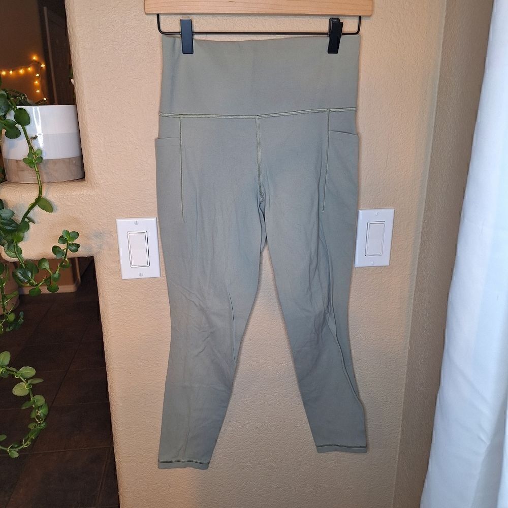 Athleta salutation 7/8 tight small green